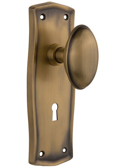 Prairie Design Mortise Lock Set With Oval Brass Knobs in Antique Brass.